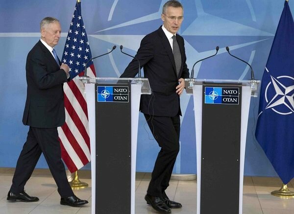 NATO Secretary General Jens Stoltenberg, right, and U.S. Secretary of Defense Jim Mattis