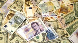 Money , banknotes. Dollar , Euro and Norwegian kroner.
