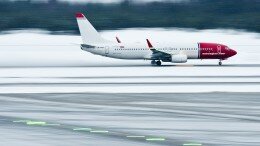 A Norwegian plane takes off from Oslo Airport