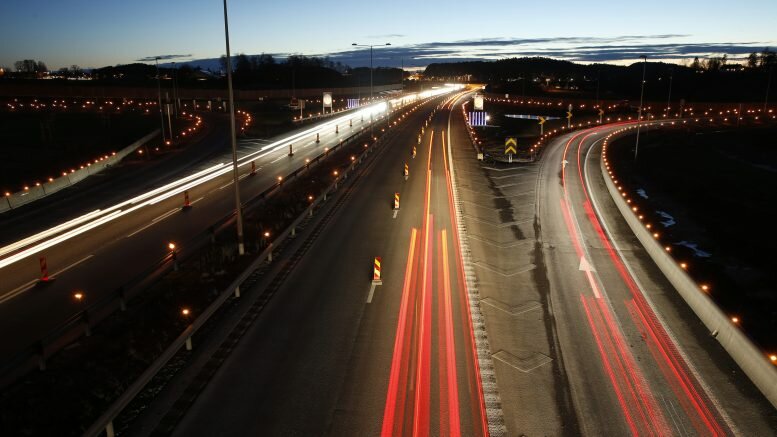 Lit torches along the E18 in the during the event Light for reflection in Stokke in Vestfold