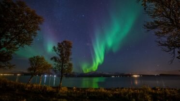 WHAT CAUSES THE NORTHERN LIGHTS?