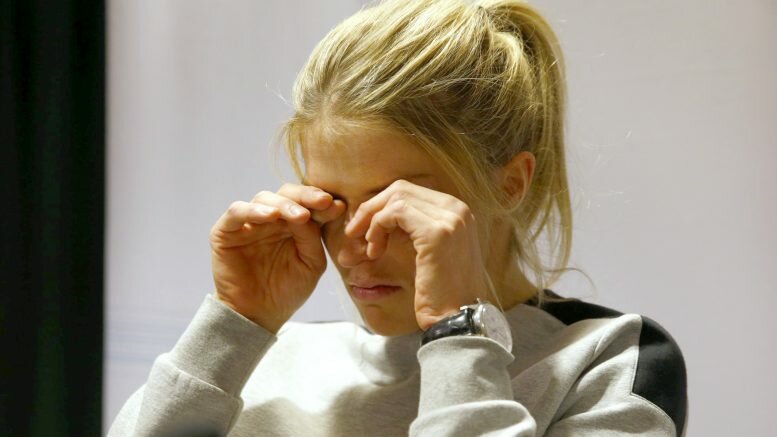 A weeping skier Therese Johaug at Thursday's press conference