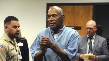 After just nine years, O.J. Simpson walks from Nevada prison a free man
