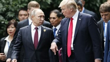 Trump greets Putin in Vietnam