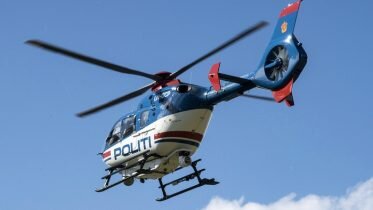 Armed man arrested after car chase