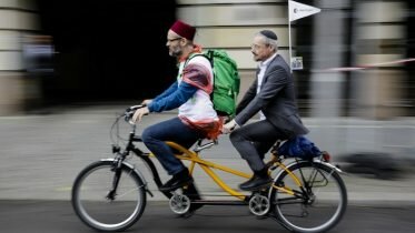 Imams and rabbis on tandem ‘bikes against hatred’ in Berlin