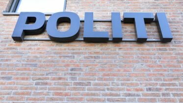 Police officer charged with sharing info