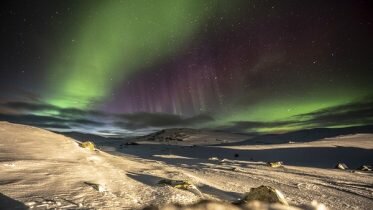 Northern Lights over starry southern Norway