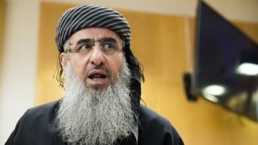 Mulla Krekar is transported to Italy